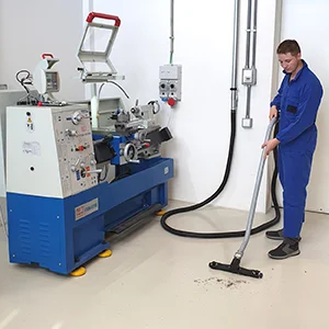 Operation of floor cleaning demonstration using a central vacuum cleaner